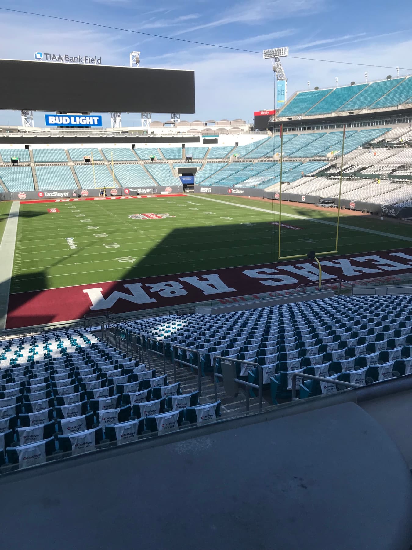 An empty football stadium prepared for the Gator Bowl before fans arrive